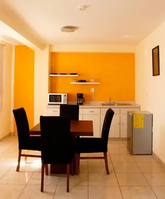 Una cocina o zona de cocina en Sensity Home Departamento 3 Encantador, Acogedor y Amplio