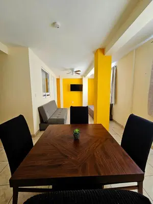 Zona de estar de Sensity Home Departamento 3 Encantador, Acogedor y Amplio