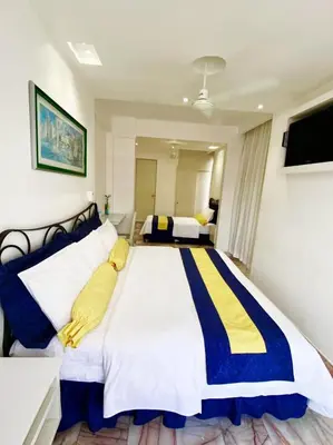 Cama o camas de una habitación en Hotel Presidente Vicente Guerrero