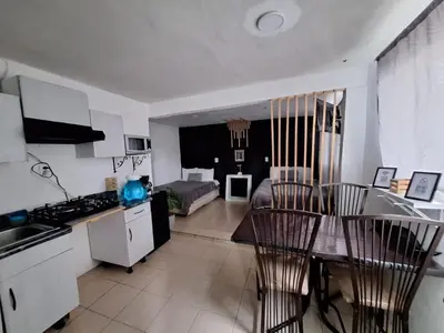 Una cocina o zona de cocina en Hermoso Loft a 15min AICM