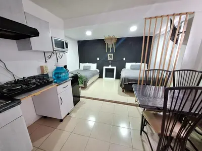 Una cocina o zona de cocina en Hermoso Loft a 15min AICM