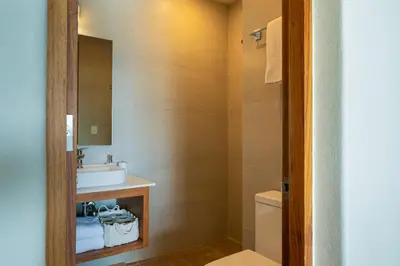 Un baño de Playa Sur Paradise - Beachfront Living