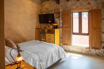 Cama o camas de una habitación en ¡Carlo Crivelli Master: el estilo en ValQuirico!