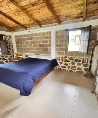 Cama o camas de una habitación en OYO Hotel Rincon De Texolo