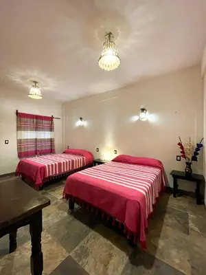 Cama o camas de una habitación en Hotel Yalnazac Mitla
