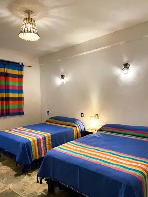 Cama o camas de una habitación en Hotel Yalnazac Mitla