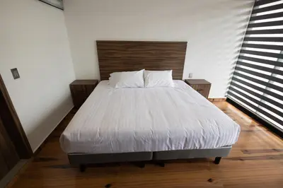 Cama o camas de una habitación en Departamentos Amaneceres Zacatlán