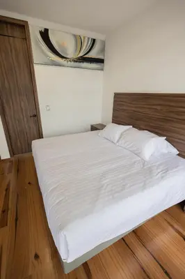 Cama o camas de una habitación en Departamentos Amaneceres Zacatlán