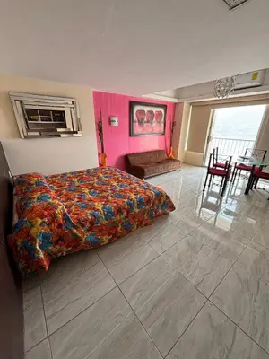 Cama o camas de una habitación en Apartamento con vista al mar