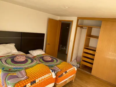 Cama o camas de una habitación en Departamento en zona Angelopolis