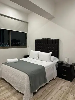 Cama o camas de una habitación en Blue Towers Piso 9 - Departamento Moderno en Puebla