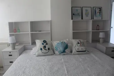 Cama o camas de una habitación en Condominio Galeón