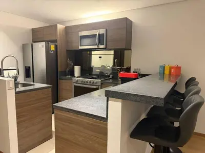 Una cocina o zona de cocina en Depto High Park Sur