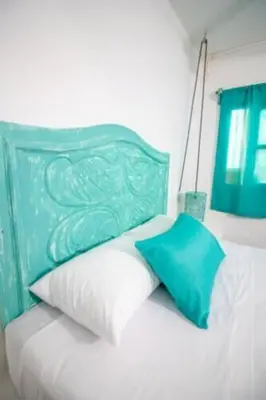 Cama o camas de una habitación en Hotel Costa 55 Puerto Escondido