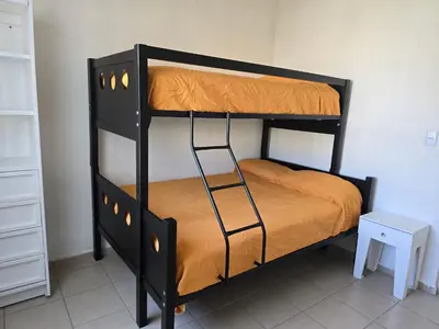 Cama o camas de una habitación en Acapulco Diamante, Real del Palmar