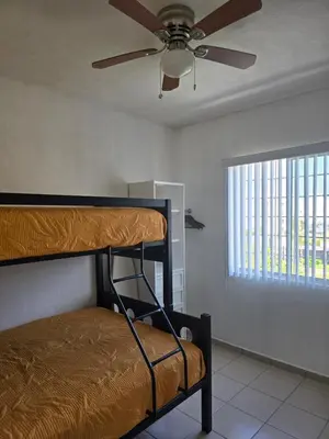 Cama o camas de una habitación en Acapulco Diamante, Real del Palmar
