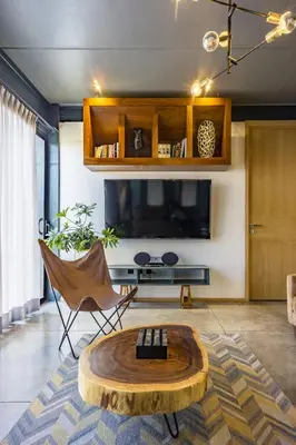 Una televisión o centro de entretenimiento en HERMOSO Departamento Boutique en Centro de Puebla