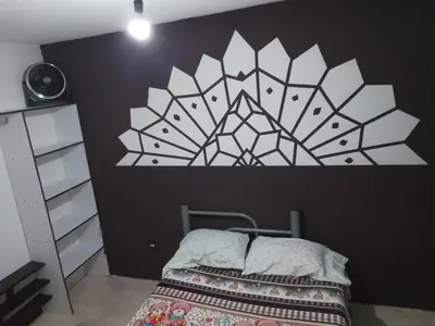 Cama o camas de una habitación en Renta de Habitaciones en muy buena ubicación