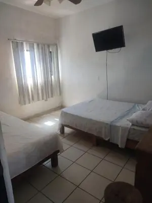 Cama o camas de una habitación en Hotel La Laguna