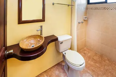 Un baño de Hotel El Patio