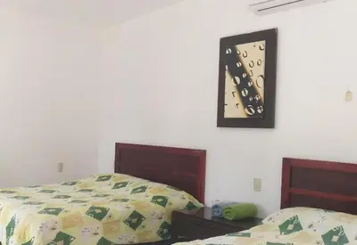 Cama o camas de una habitación en Hotel Mariam