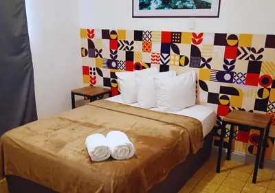 Cama o camas de una habitación en Depa a 3 min de Plaza Portales