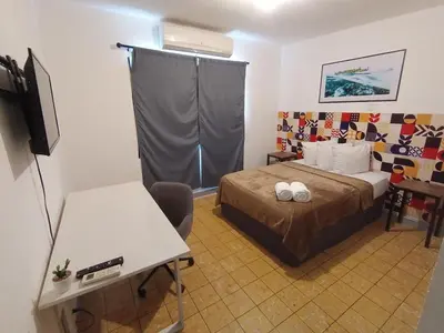 Cama o camas de una habitación en Depa a 3 min de Plaza Portales