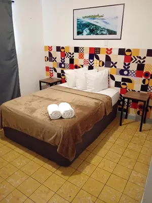 Cama o camas de una habitación en Depa a 3 min de Plaza Portales