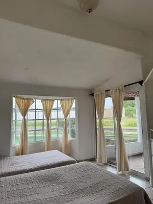 Cama o camas de una habitación en Villa Residencial Aéreo Albatros