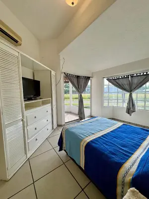Cama o camas de una habitación en Villa Residencial Aéreo Albatros