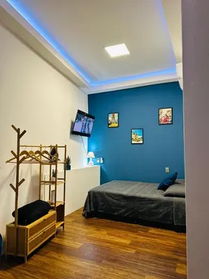 Una televisión o centro de entretenimiento en Casa Don José ORQUIDEAS Suite