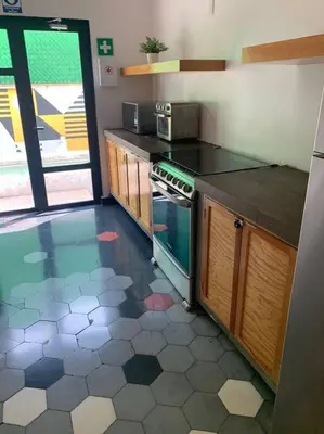Una cocina o zona de cocina en Nuevo Loft con Gym con Alberca y Terraza