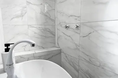 Un baño de Habitación acogedora
