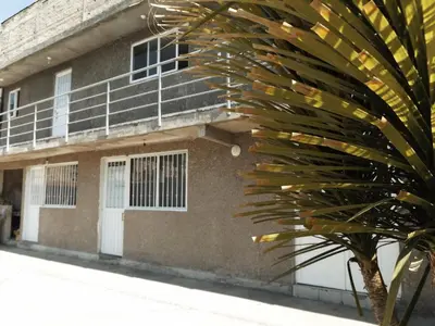 Edificio en el que se encuentra la habitación en casa particular