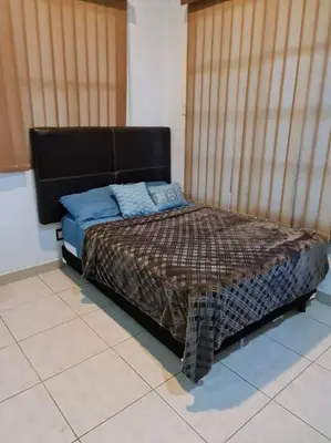 Cama o camas de una habitación en Quinta El Guitarron