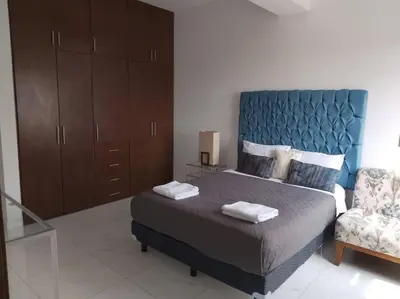 Cama o camas de una habitación en Apartamento de lujo Col La Paz 201