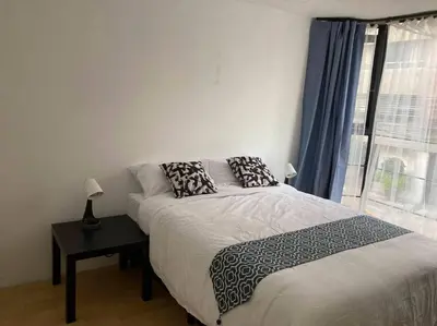Cama o camas de una habitación en Ubicadísimo departamento