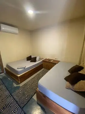 Cama o camas de una habitación en Casa Selva casa privada con alberca, en Punta