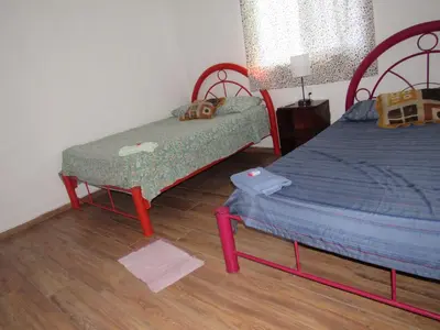 Cama o camas de una habitación en La bamba surf house