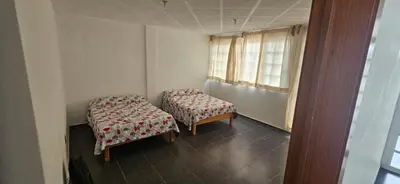 Cama o camas de una habitación en El rinconcito de Allison