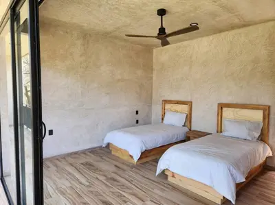Cama o camas de una habitación en ACOGEDORA CASa EN MALINALCO
