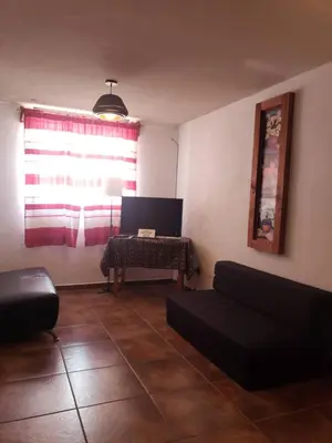 Zona de estar de Departamento Jardín Magnolia