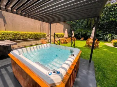 Jardín al aire libre en Hotel Boutique Casa Alebrije