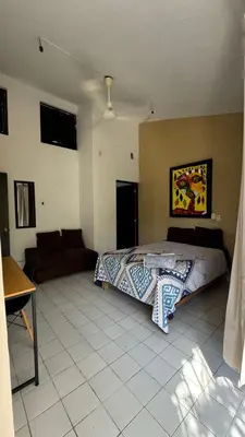 Una televisión o centro de entretenimiento en Casa Zen Santa cruz