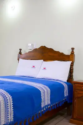 Cama o camas de una habitación en Hotel Magda