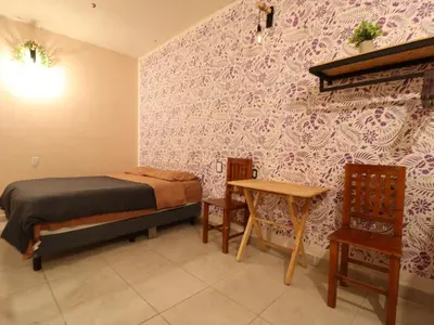 Cama o camas de una habitación en Casa Corazon Centro
