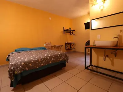 Cama o camas de una habitación en Casa Corazon Centro