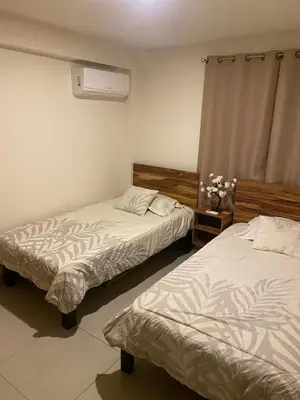 Cama o camas de una habitación en Acapulco costera