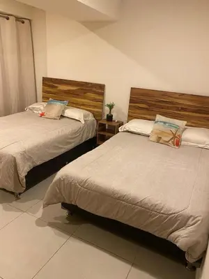 Cama o camas de una habitación en Acapulco costera