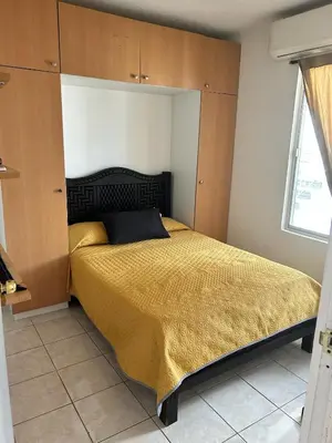 Cama o camas de una habitación en Departamento Economico Arroyo